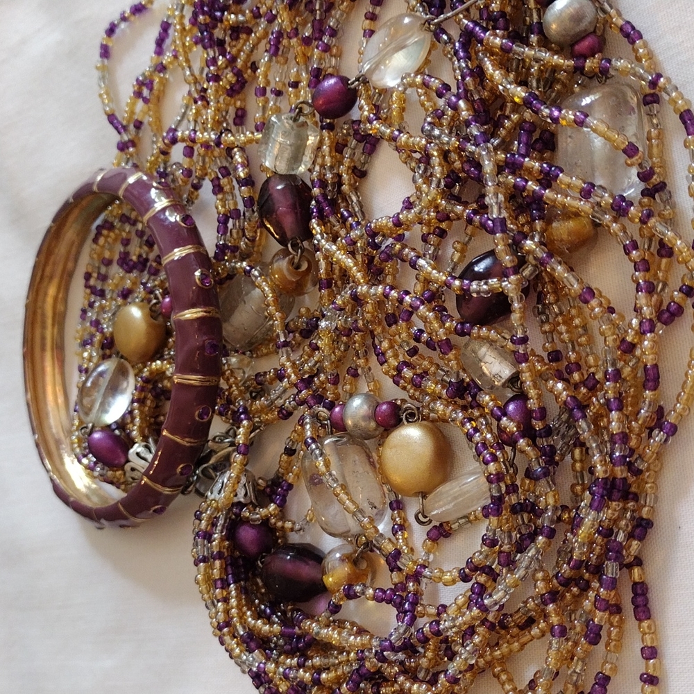 (A2) Multi-Strand Gold and Purple Glass Beads.....